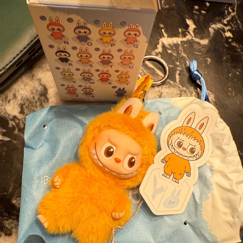 Charming Orange Furry Keychain with Character